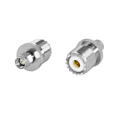 Redukce z SMA vidlice na UHF zásuvka. Impedance 50ohm. Materiál: niklovaná mosaz (NM), izolace: teflon 